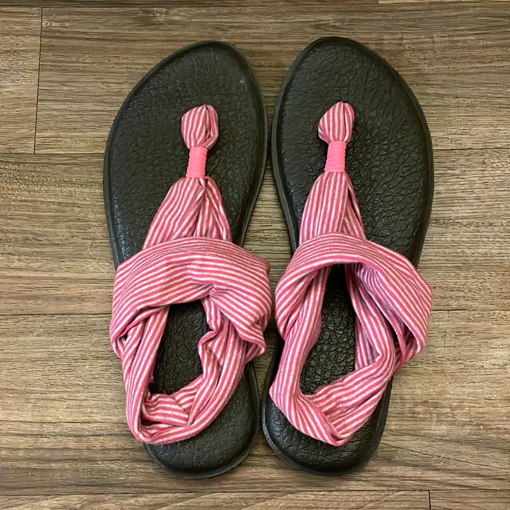 Black, gray and pink size 6 Sanuk Sandals. Never worn